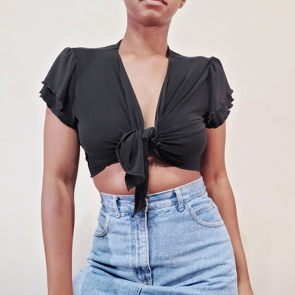 Black cropped wrap tie top with lettuce leaf hem
